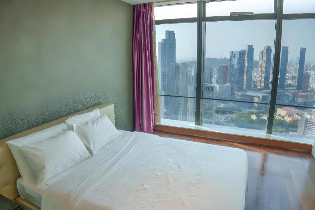 Grand Madison Qingdao Harbour-View Central（Former Qingdao Farglory Hotel） Екстер'єр фото